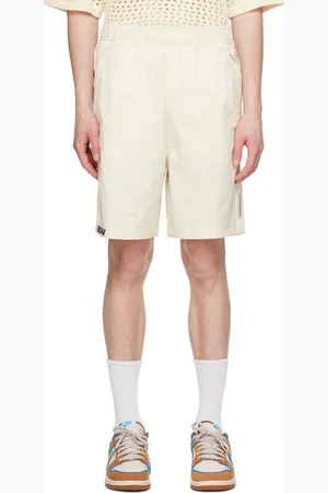 A Bathing Ape Short blanc cassé à logo brodé