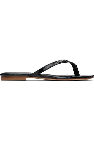 COPERNI Tongs noires en cuir gaufré façon croco à bout biaisé
