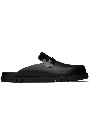 Salvatore Ferragamo Mules noires à ferrures Gancini