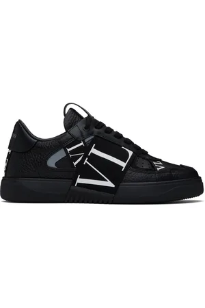 VALENTINO GARAVANI Baskets basses noires en cuir de veau à garnitures VL7N