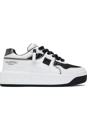 VALENTINO GARAVANI Baskets basses blanc et noir à clou One Stud et à plateforme
