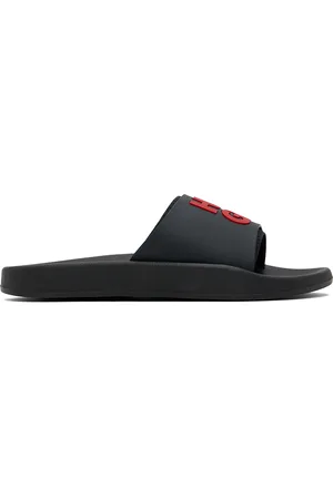 HUGO BOSS Sandales à enfiler noires à logo modifié