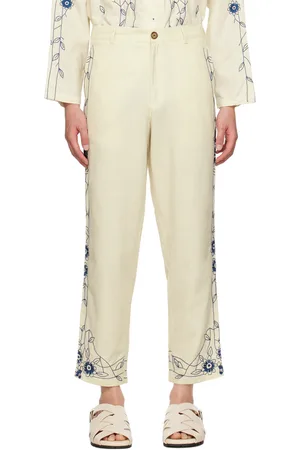 HARAGO Pantalon blanc cassé à motif fleuri brodé