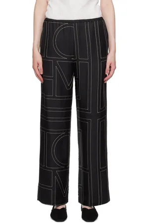 Totême Pantalon de détente noir à monogrammes