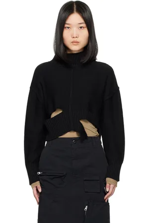 Maison Margiela Pull noir à découpes