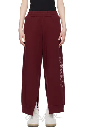 Maison Margiela Pantalon de détente rouge à logo numérique imprimé