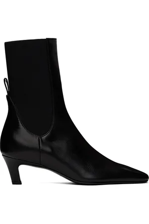 Totême Bottes à petit talon noires en cuir