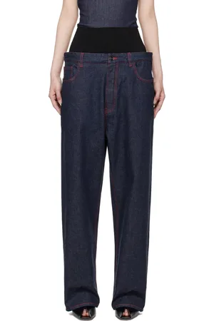 Alaïa Jean bleu à bande en tricot