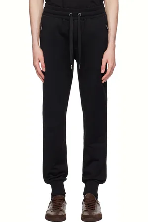 Dolce & Gabbana Pantalon de survêtement noir à plaque à logo - Essential