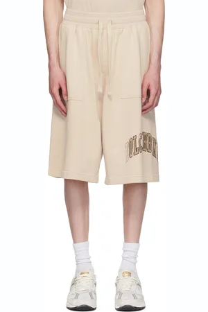 Dolce & Gabbana Short beige à logo brodé