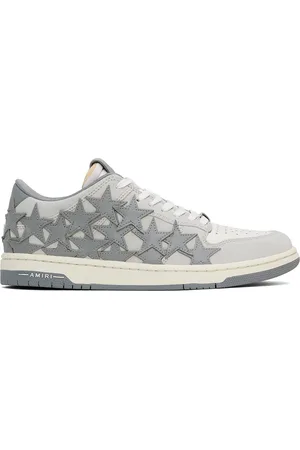 AMIRI Baskets basses gris et blanc à appliqués d