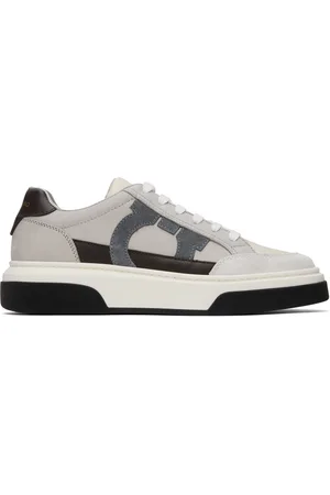Salvatore Ferragamo Baskets basses gris et blanc cassé à appliqué Gancini