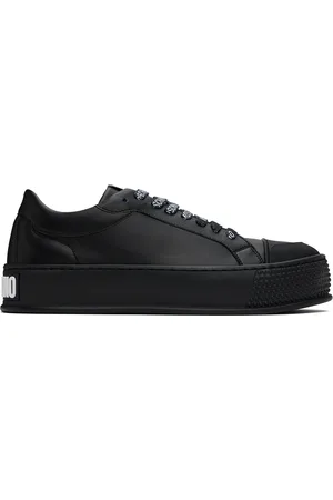 Moschino Baskets noires à semelle texturée