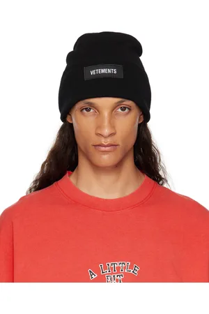 Vetements Bonnet noir à écusson à logo