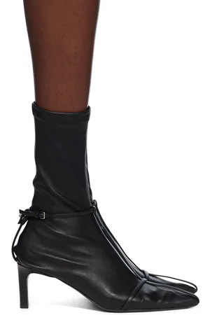 Jil Sander Bottes noires en cuir nappa extensible