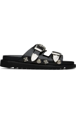 TOGA PULLA Sandales noires à boucles exclusives à SSENSE