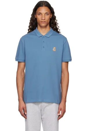 Moschino Polo bleu à écusson d