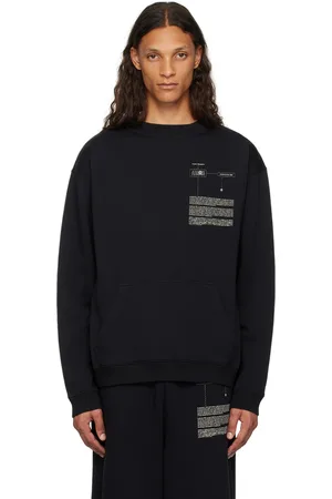 Maison Margiela Pull molletonné noir à poche kangourou