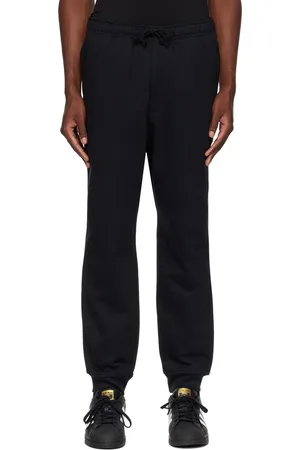 Y-3 Pantalon de survêtement noir à revers en tricot côtelé