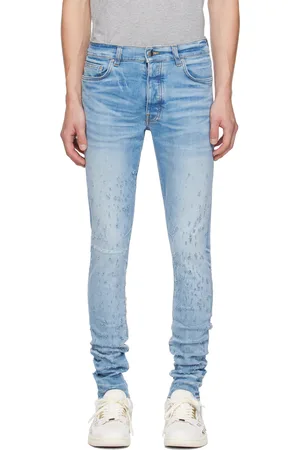 AMIRI Jean skinny bleu à effet usé Shotgun