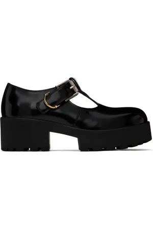 Givenchy Flâneurs noirs à ferrure Voyou