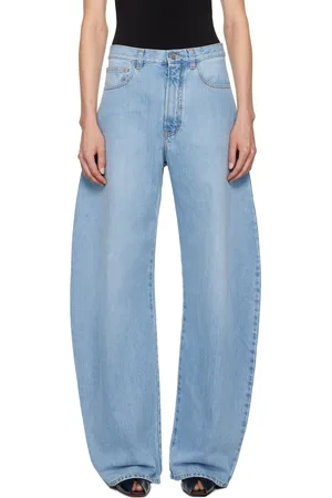 Alaïa Jean bleu à coutures extérieures incurvées