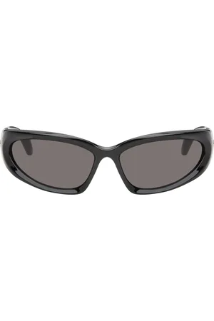 Balenciaga Lunettes de soleil ovales Swift noires