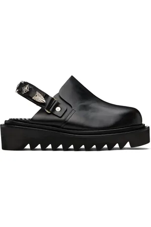 TOGA PULLA Flâneurs de style mule noirs à bride arrière exclusifs à SSENSE