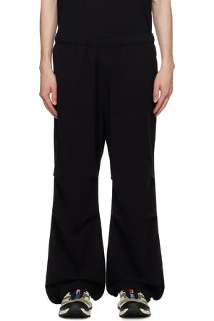 Maison Margiela Pantalon de survêtement noir à nervures