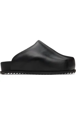 Yume Yume Flâneurs à enfiler de style chaussure de camionneur noirs