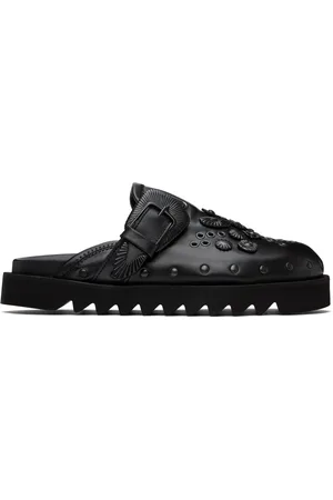 TOGA PULLA Flâneurs de style sabot noirs à œillets exclusifs à SSENSE