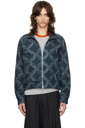 DRIES VAN NOTEN Blouson de survêtement bleu marine à motif de chaines pixelisées imprimé