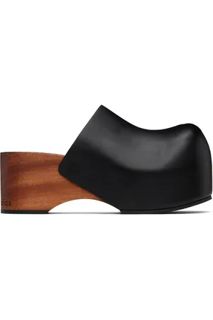Acne Studios Sabots noirs en cuir à semelle en bois