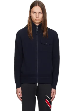 Moncler Cardigan bleu marine à glissière et à arrière rembourré en duvet