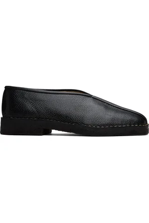 LEMAIRE Chaussures à enfiler noires à semelle en crêpe et à passepoil