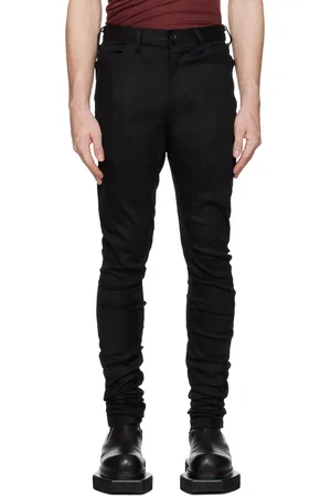 JULIUS Jean skinny noir à coutures extérieures incurvées
