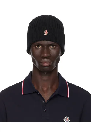 Moncler Bonnet noir en tricot côtelé de laine - Après-ski