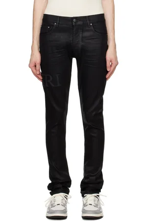 AMIRI Jean skinny ciré noir à logo