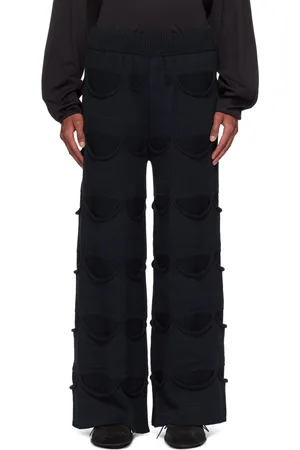 Isa Boulder Pantalon bleu marine à poches plaquées exclusif à SSENSE