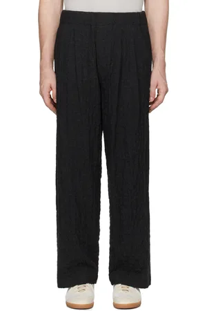Document Pantalon gris en laine et en coton à plis et taille élastique