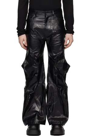 JULIUS Jean noir à coutures pincées de style épine