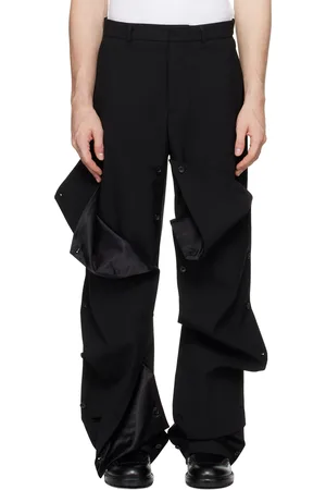 Y / PROJECT Pantalon noir à panneaux à boutons
