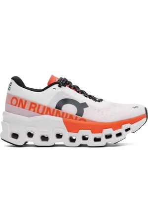 On Running Baskets Cloudmster 2 blanc et orange