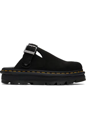 Dr. Martens Mules noires en suède à bride arrière et à semelle Zebzag