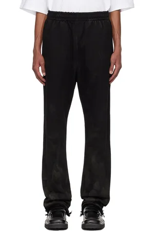 We11 Done Pantalon de survêtement noir à effet taché