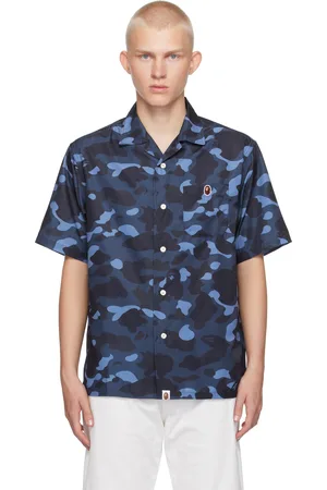 BAPE Chemise bleu marine à motif camouflage et à écusson à logo