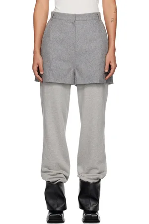 pushBUTTON Pantalon de survêtement gris en jersey à empiècement de style short