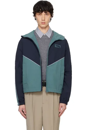 Maison Kitsuné Coupe-vent bleu et bleu marine en taffetas technique
