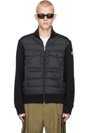 Moncler Blouson noir rembourré en duvet à glissière