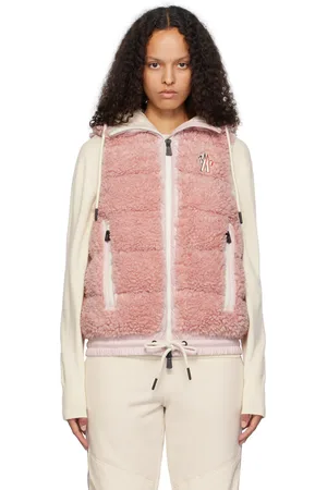 Moncler Veste rose en peau retournée synthétique rembourrée en duvet à glissières